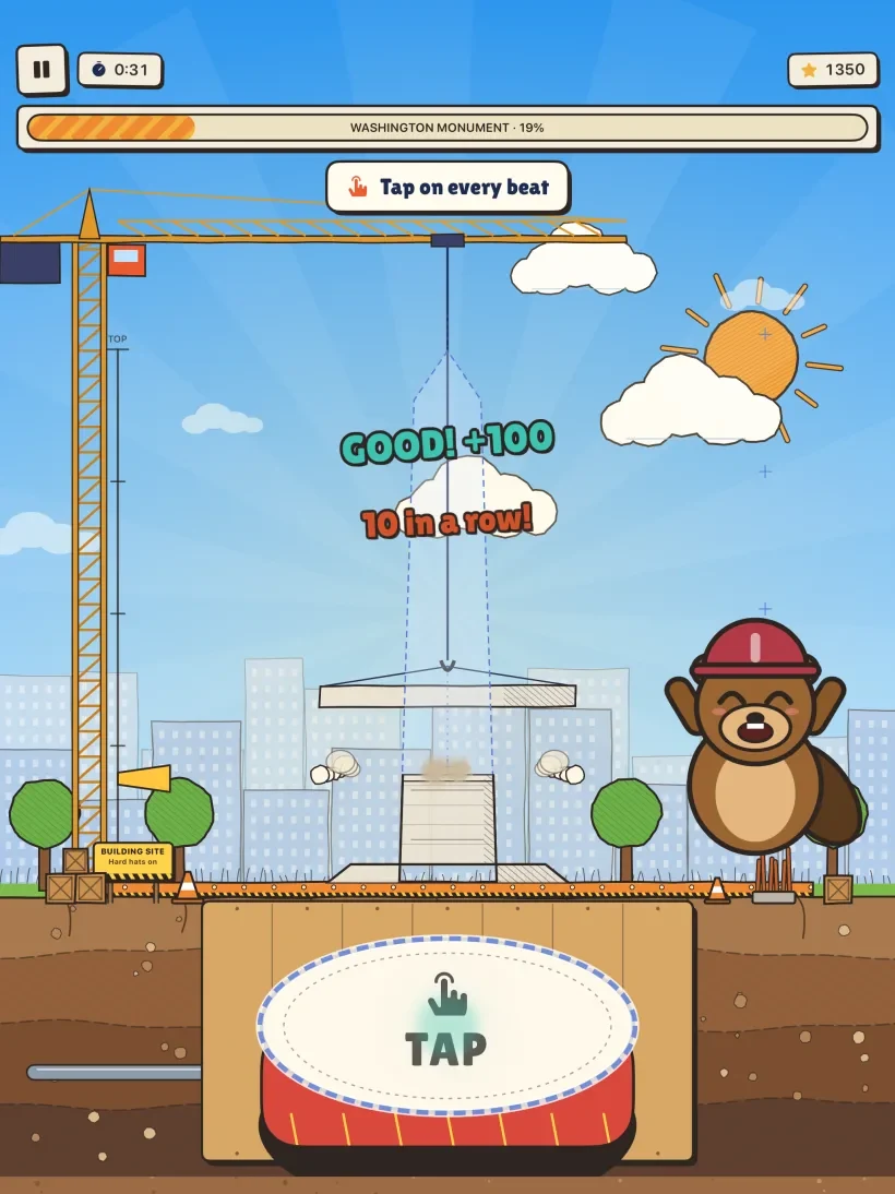 Build to the Beat gameplay: a monument rising as the child taps, with a Perfect rating on screen